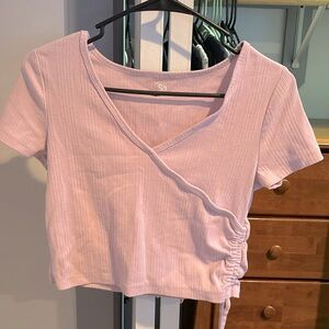 Light purple cropped tee with tie on left side